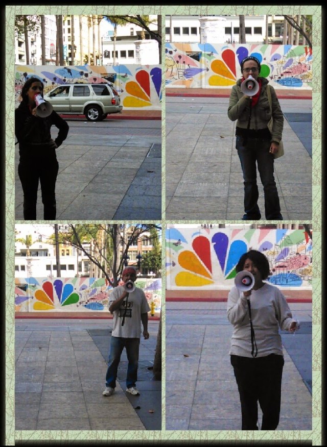 Citizens rally for media coverage of the 43 students missing in Mexico. the NBC logo is behind them.